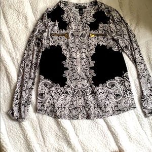 Black and white blouse with gold accent zippers